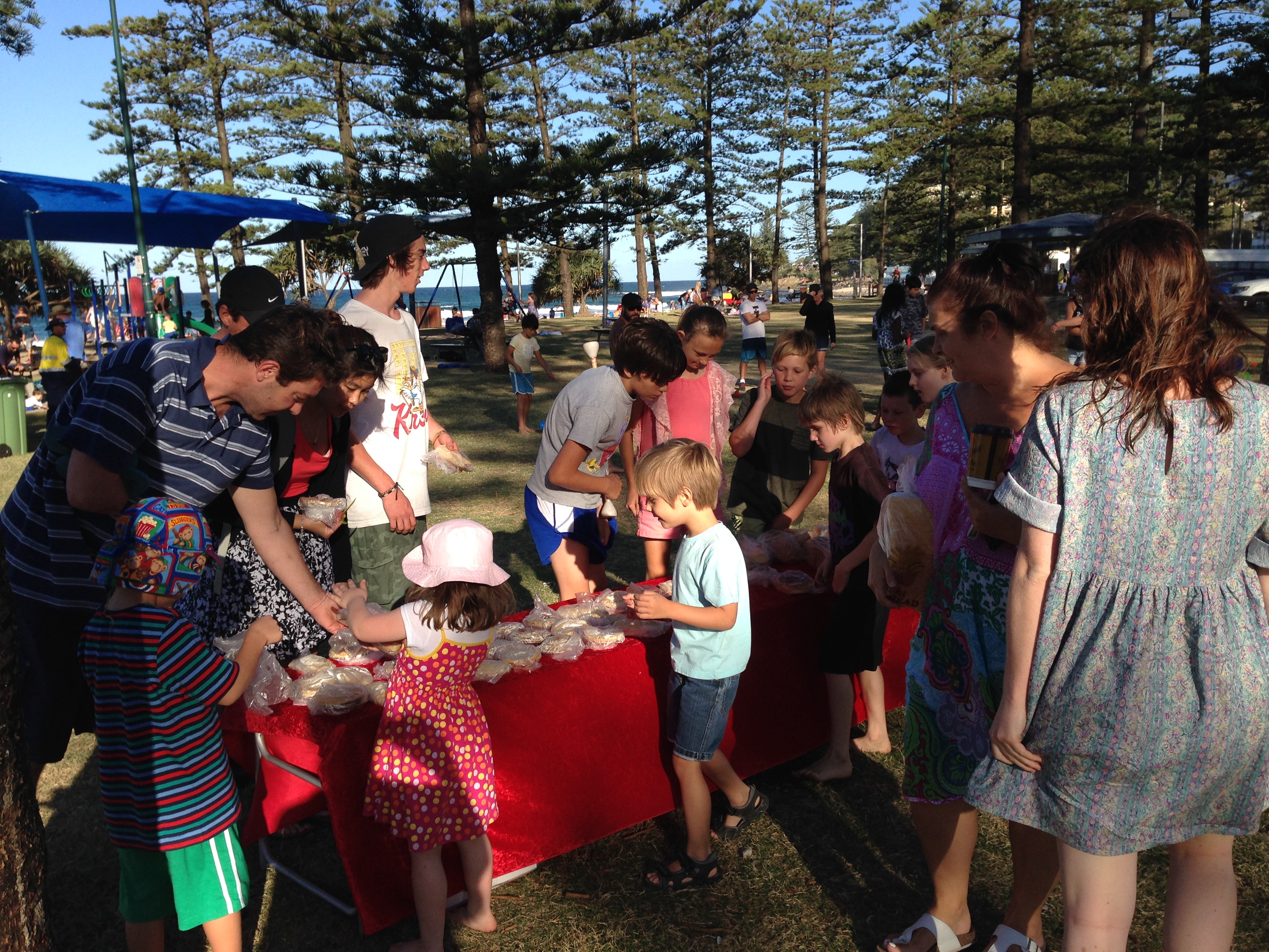 People taking their free bread at Burleigh Heads